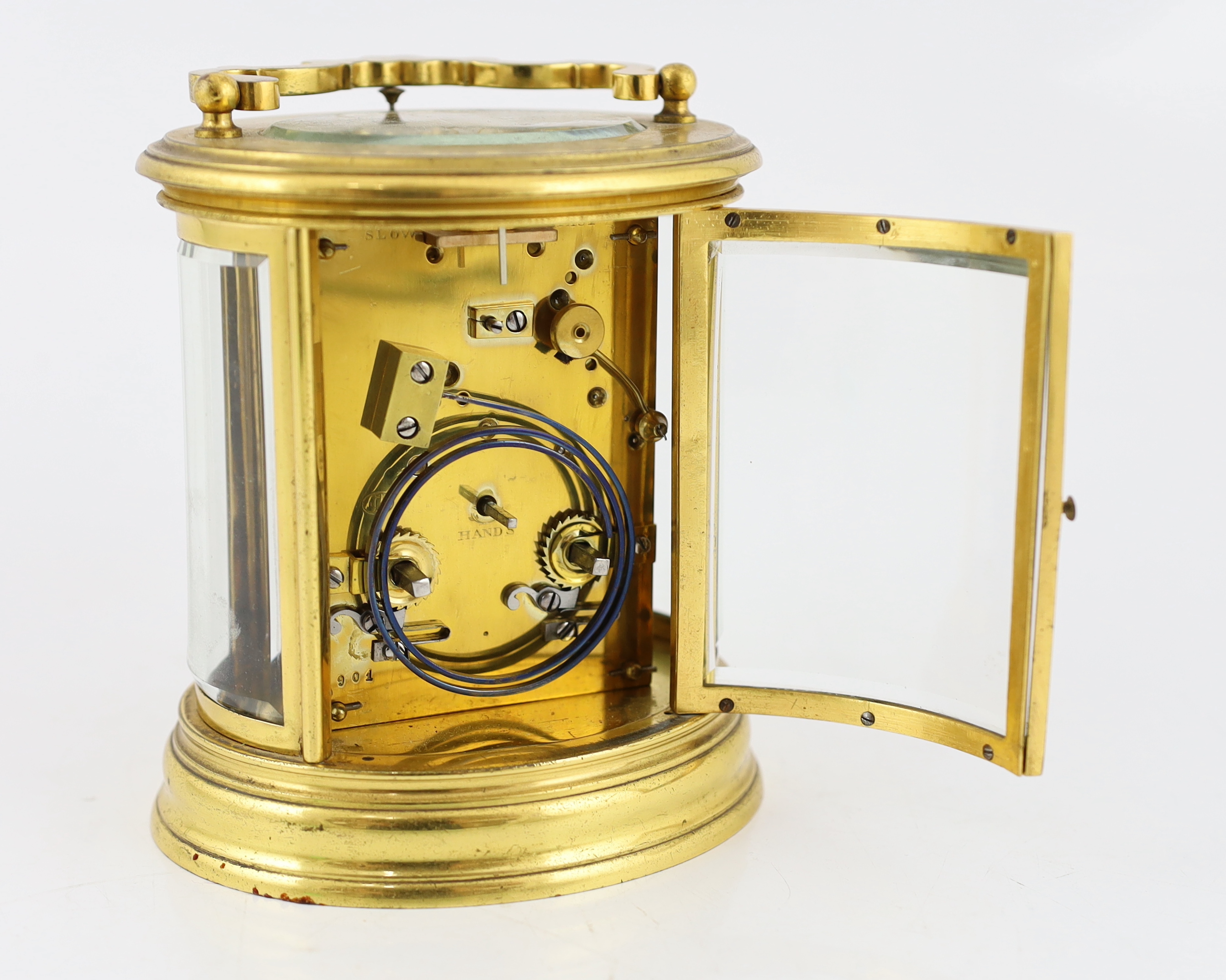 A late 19th century French brass oval cased eight day hour repeating carriage clock, by Henri Marc, 13.5cm high, Please note this lot attracts an additional import tax of 5% on the hammer price